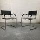 Pair of design armchairs in imitation leather chrome