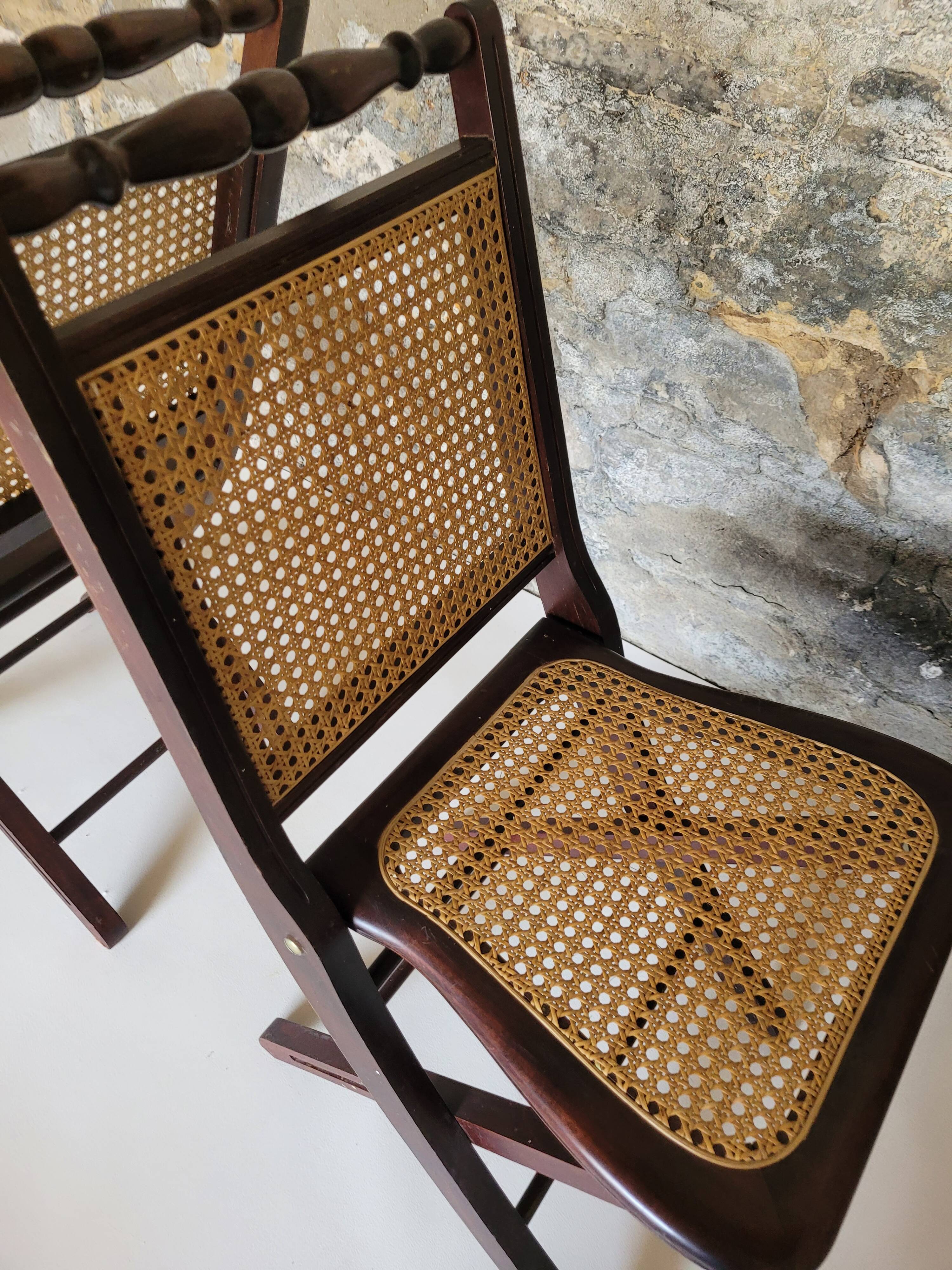Pair of folding cane chairs