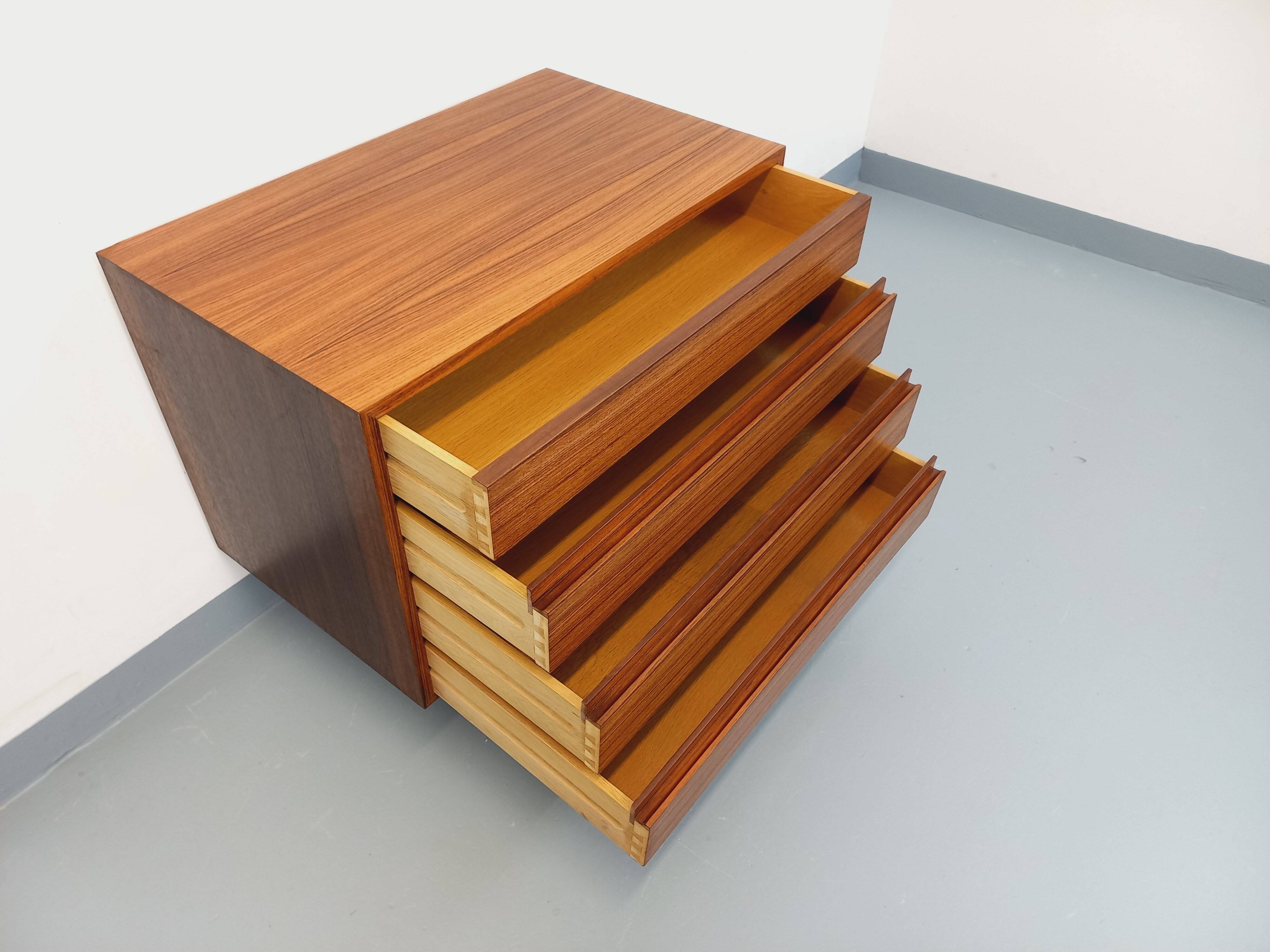 Vintage Scandinavian modernist chest of drawers in rosewood and black metal.