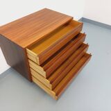 Vintage Scandinavian modernist chest of drawers in rosewood and black metal.