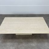 Rectangular travertine coffee table with central leg