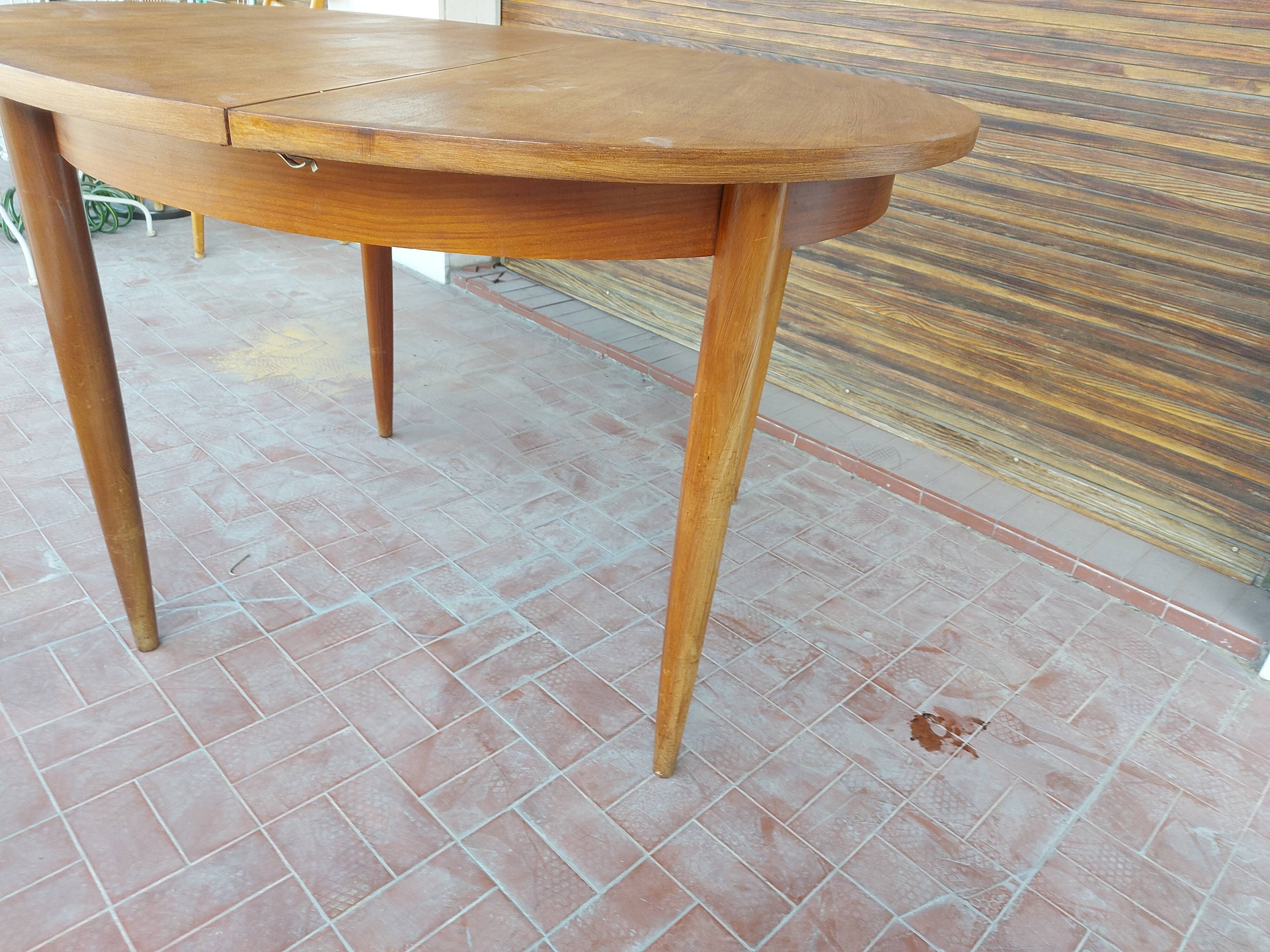 Scandinavian design teak table with extension cord