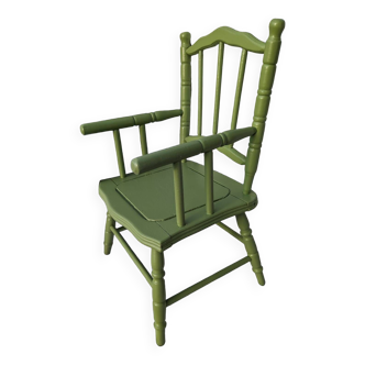 Green children's chair in turned wood