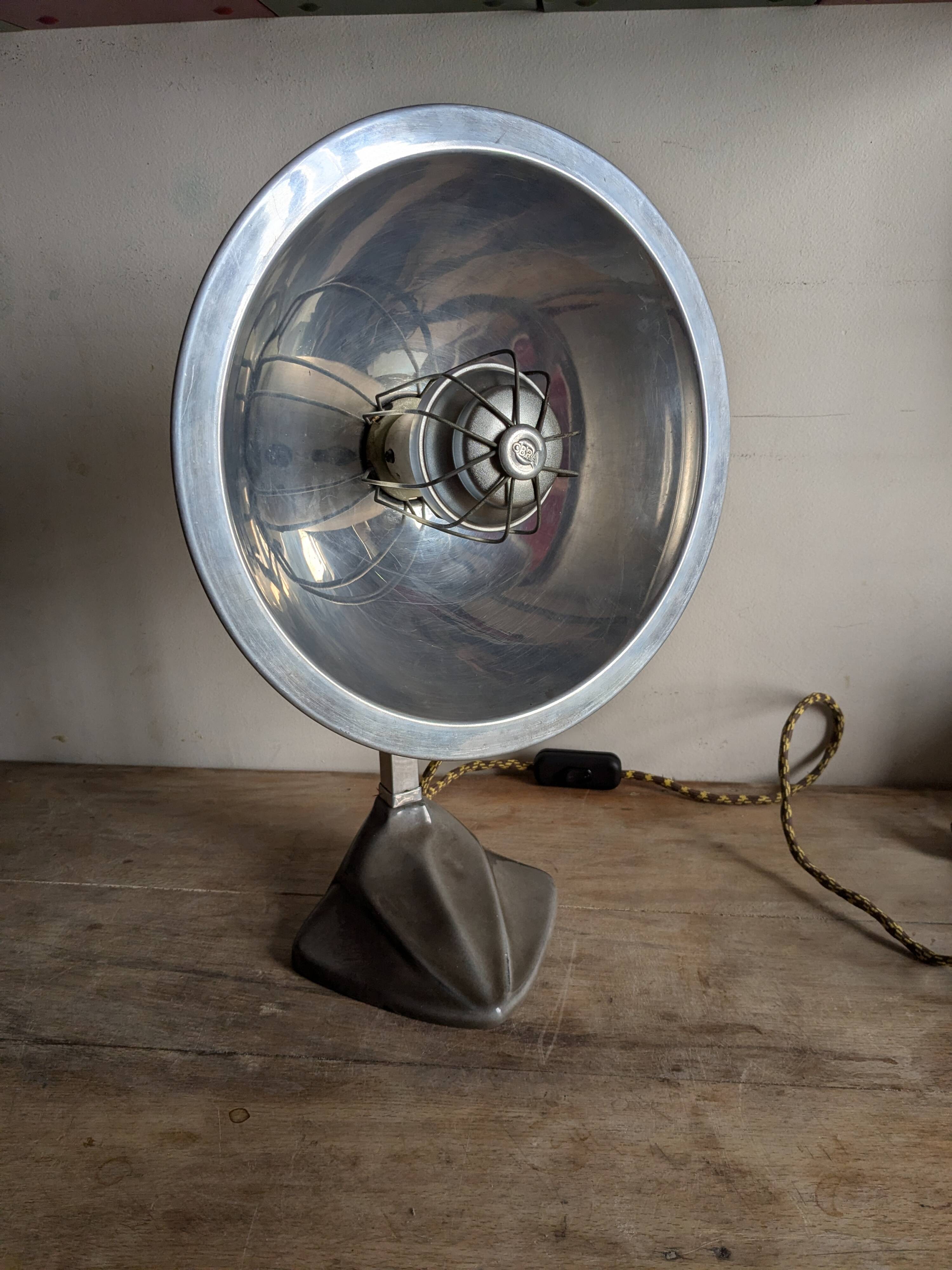 Cobra parabolic lamp with enameled cast iron base, Art Nouveau.