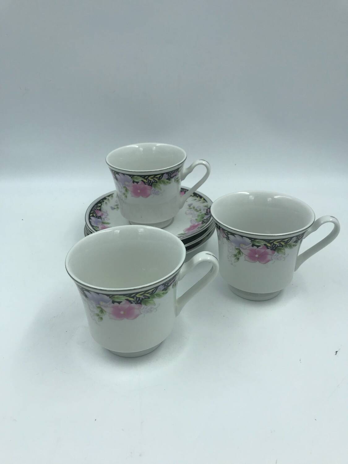 3 large cups and saucers