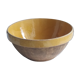 Large old salad bowl in yellow varnished earth