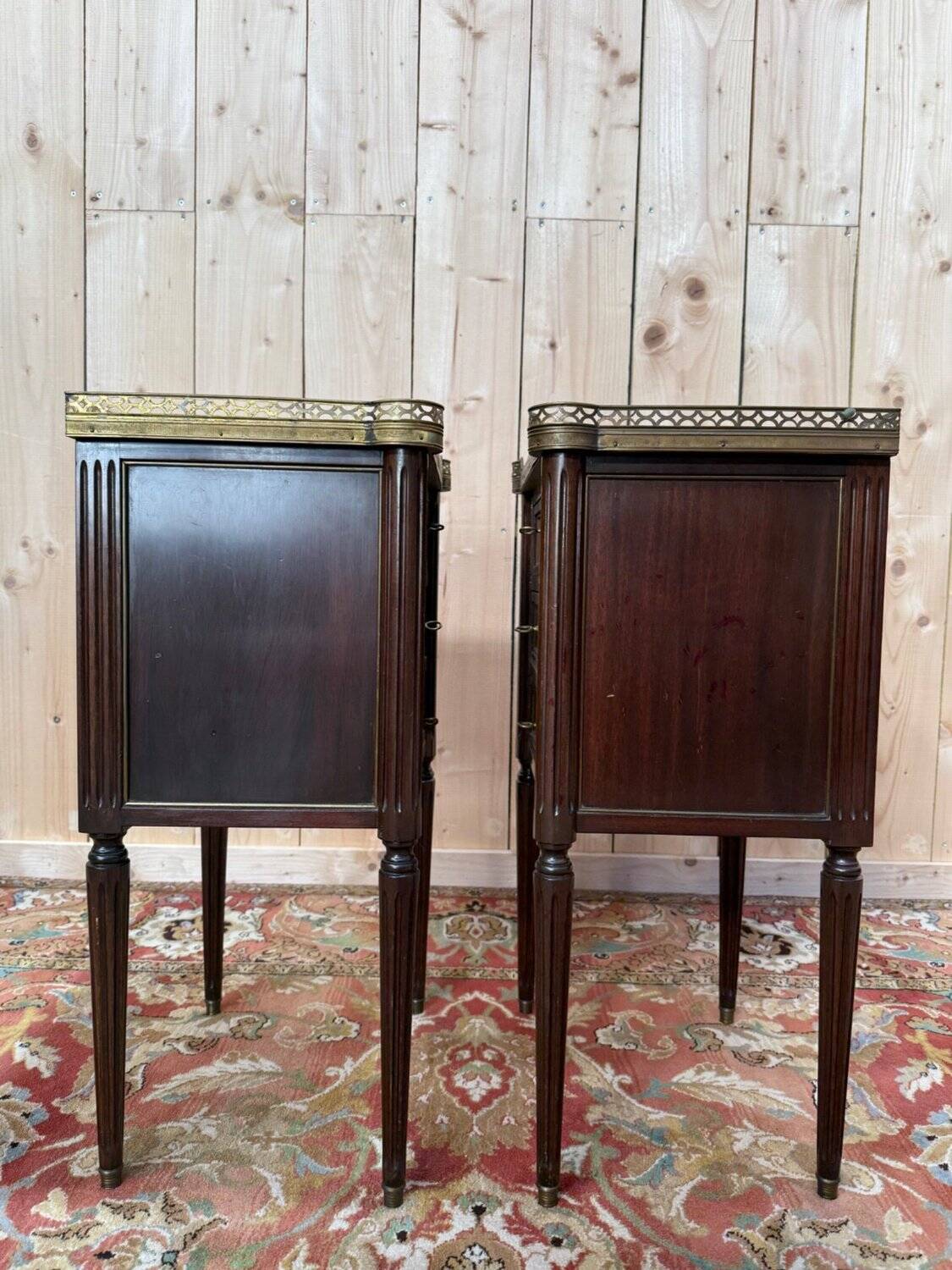 Pair of Louis XVI bedside tables in solid mahogany.