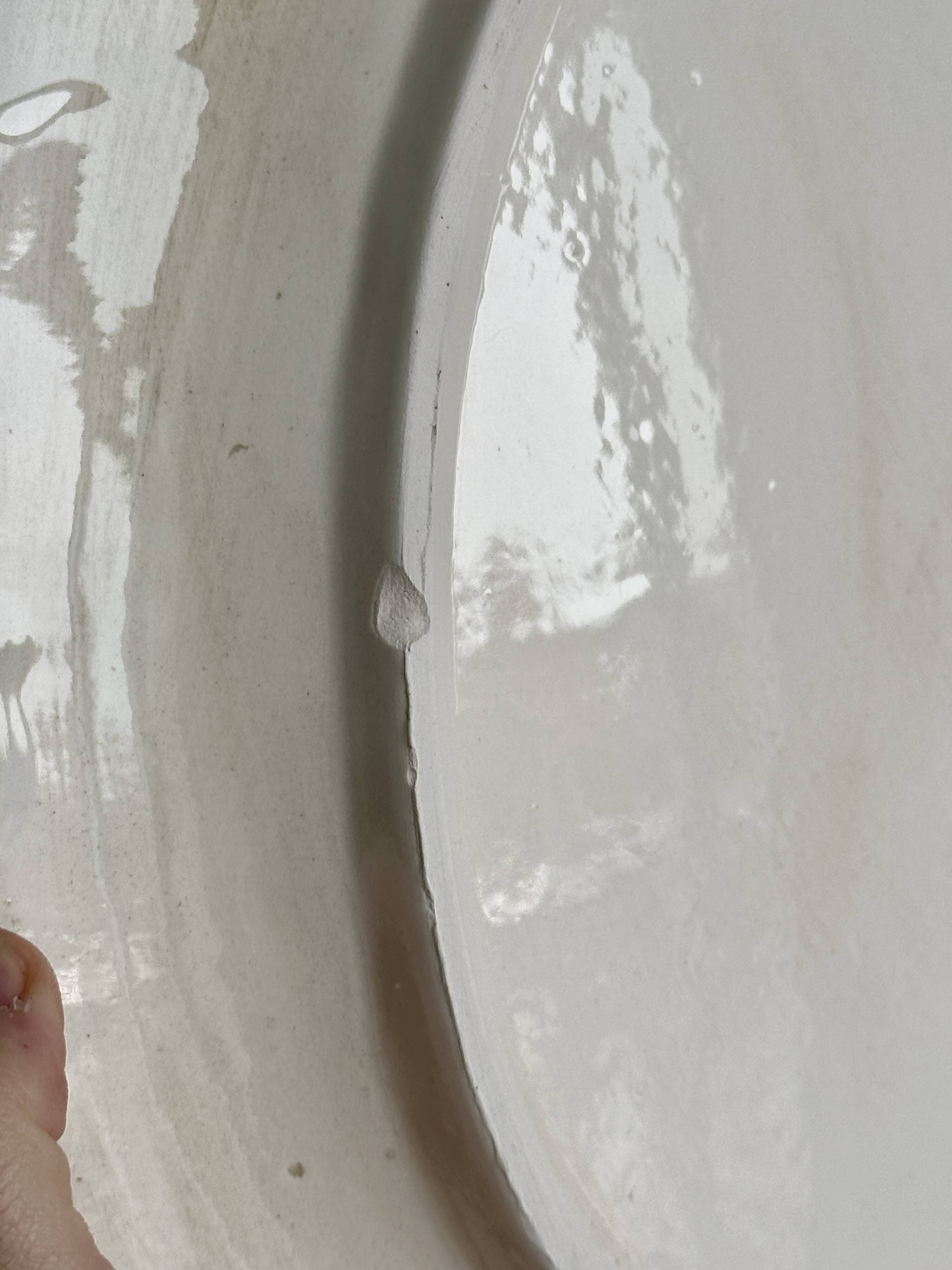 Large oval dish in sculpted white ceramic