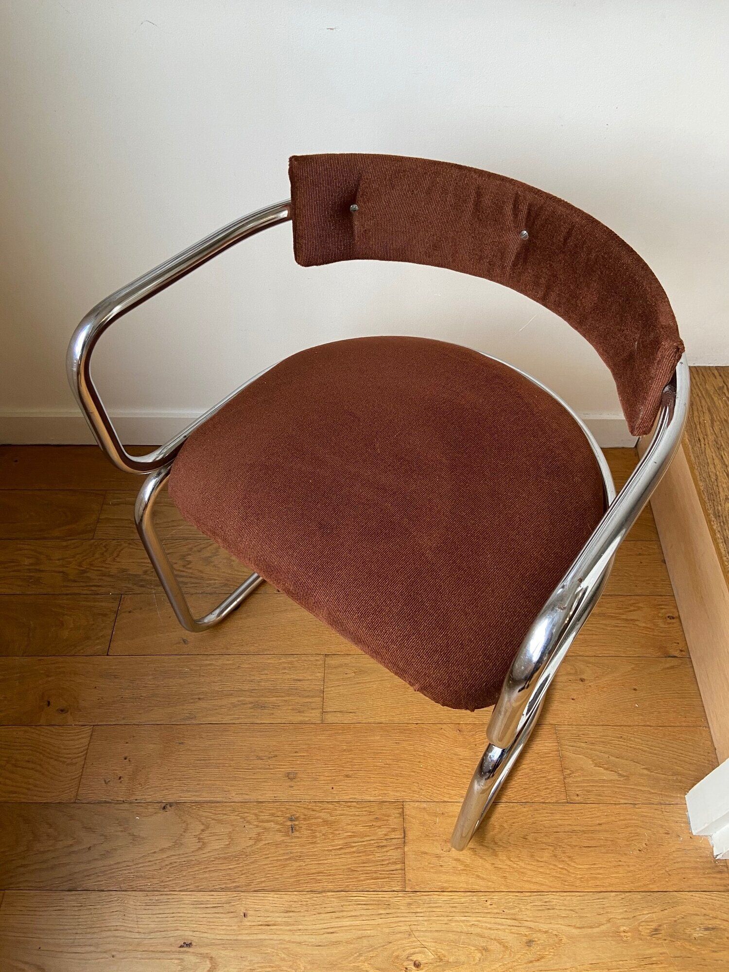 Chrome aluminum chair and brown cotton