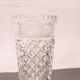 Elegant cut crystal vase in transparent Art Deco style.