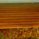 Teak table with chromed tubular metal base