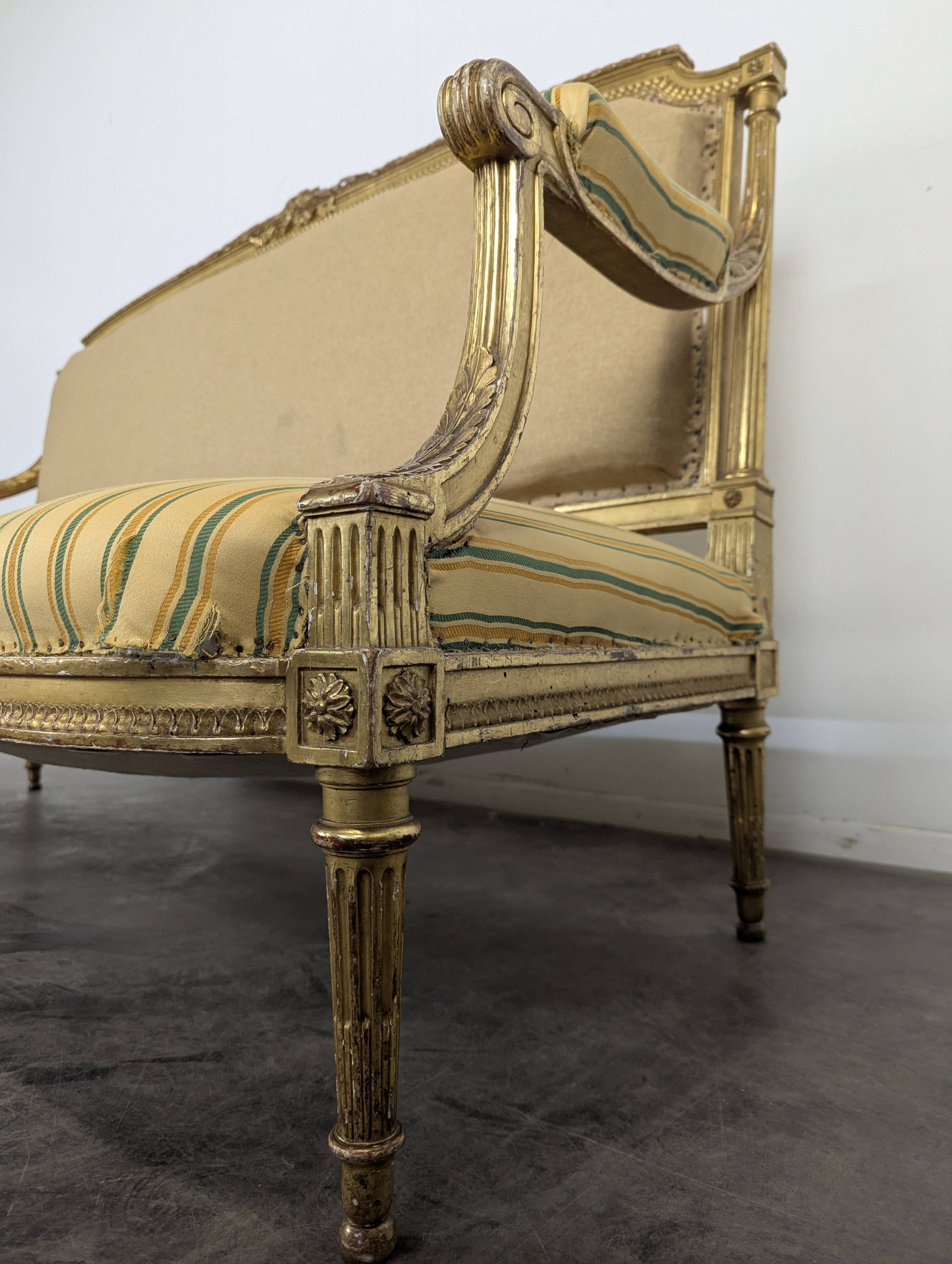 Louis XVI style canapé from the Napoleonic III era in gilded wood.