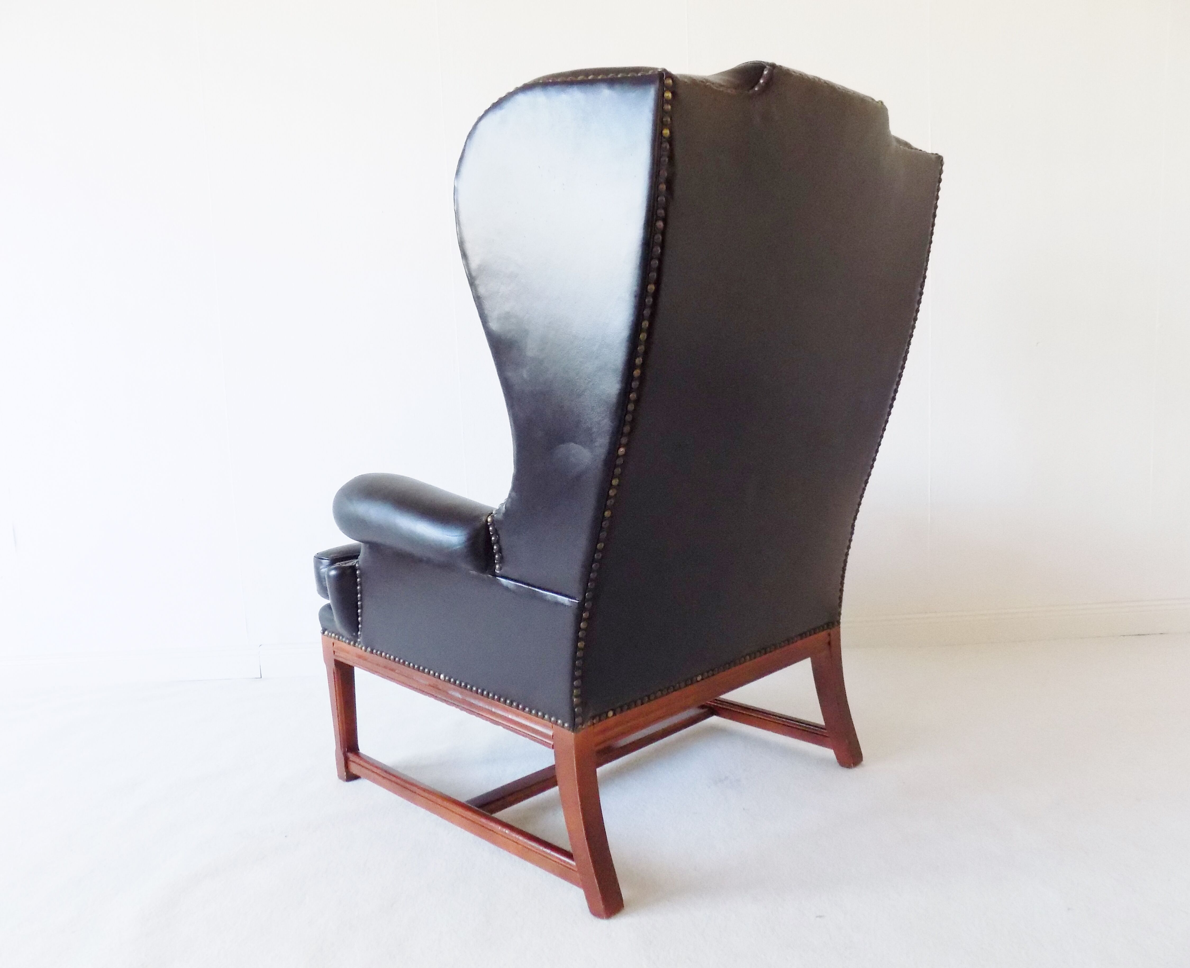 Chesterfield high back leather armchair black from the 1960s