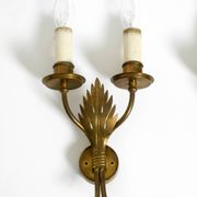 A pair of mid-century modern brass wall lamps by Vereinigte Werkstätten