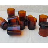 11 amber-coloured glasses