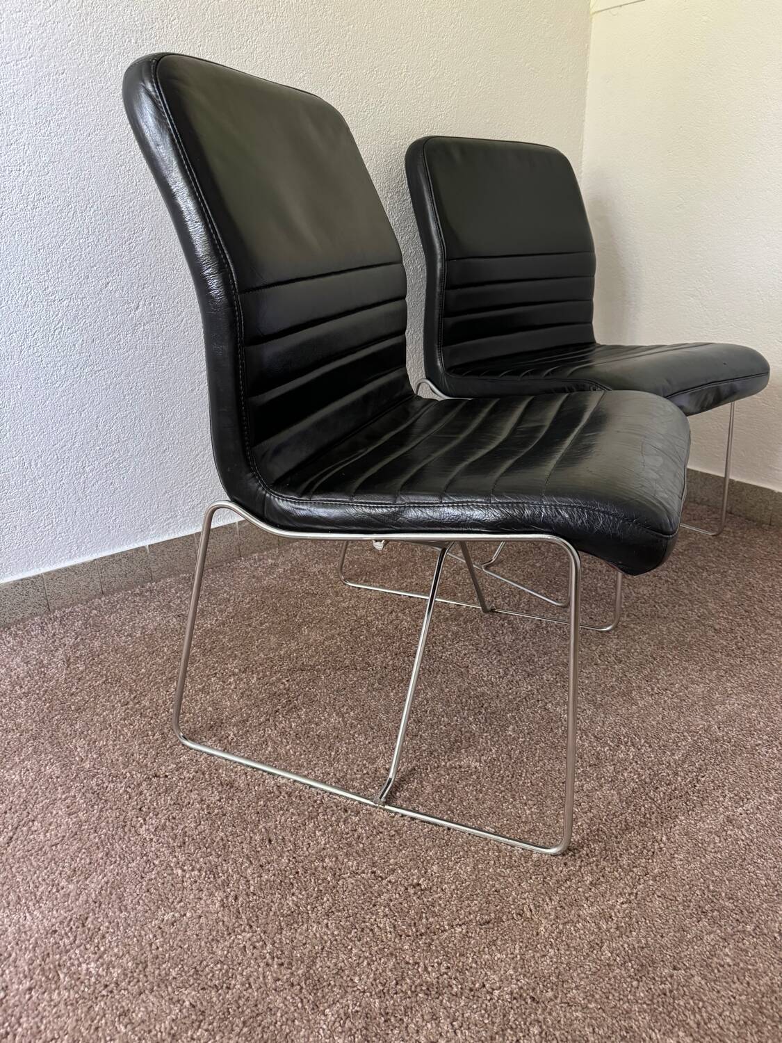 Black leather armchairs, Italian design, 70s (X2)