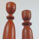Vintage pair of sculptural teak candlesticks in Scandinavian style.