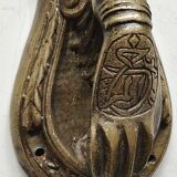 Door knocker in bronze