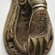 Door knocker in bronze