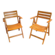 Pair of varnished wooden folding armchairs signed Clairitex.