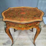 Louis XV table in red marquetry