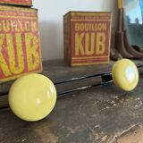 Wall coat rack with 4 vintage yellow metal hooks
