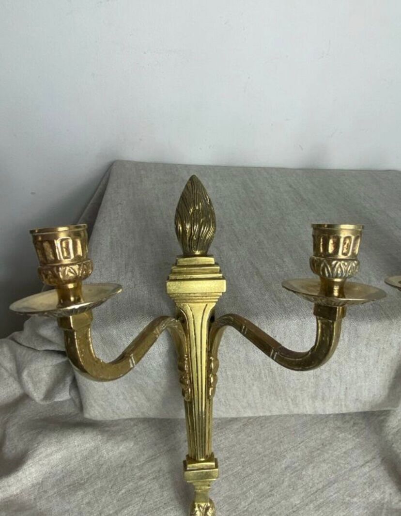 Pair of wall candle holders in bronze
