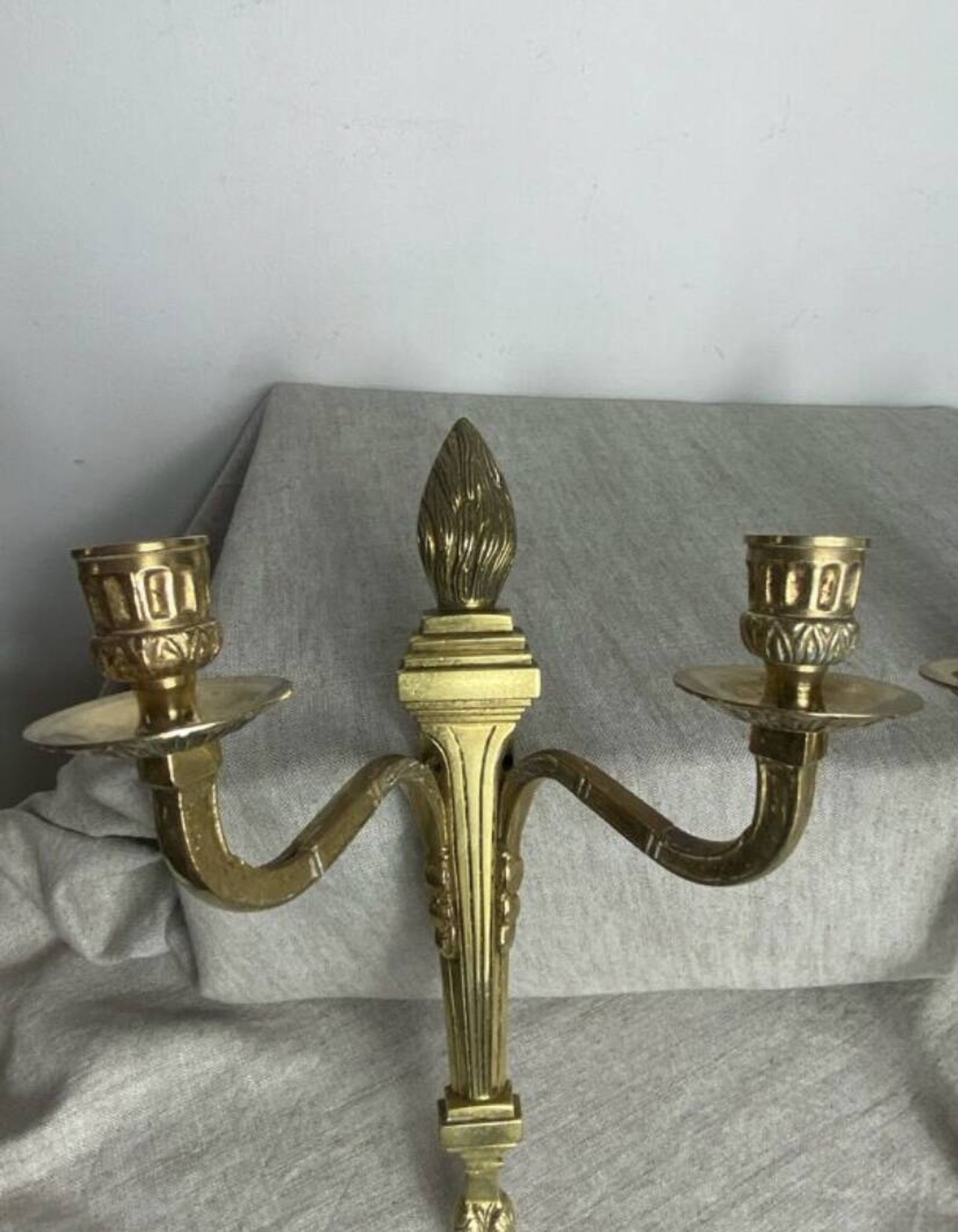 Pair of wall candle holders in bronze