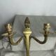 Pair of wall candle holders in bronze