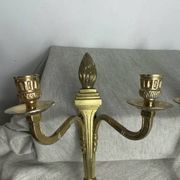 Pair of wall candle holders in bronze