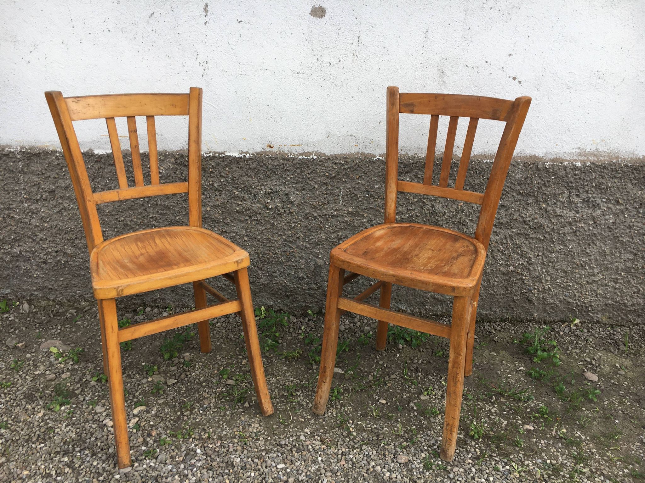 Pair of vintage curved wooden bistro chairs