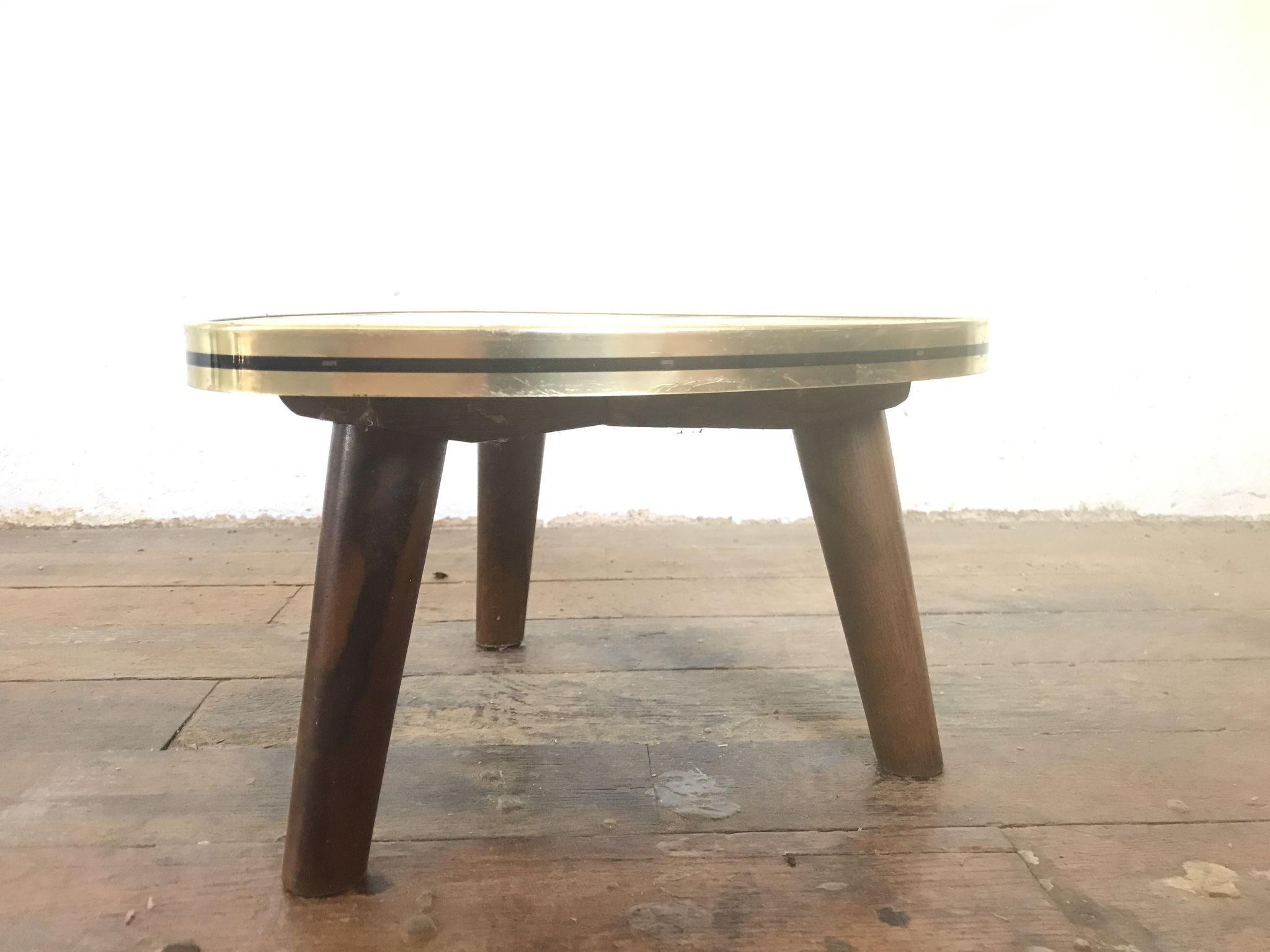 Small triangular table coffee table with a vintage tripod door midcentury plant 1950