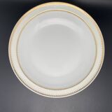 Plat rond creux en porcelaine de Limoges liseré jaune et doré