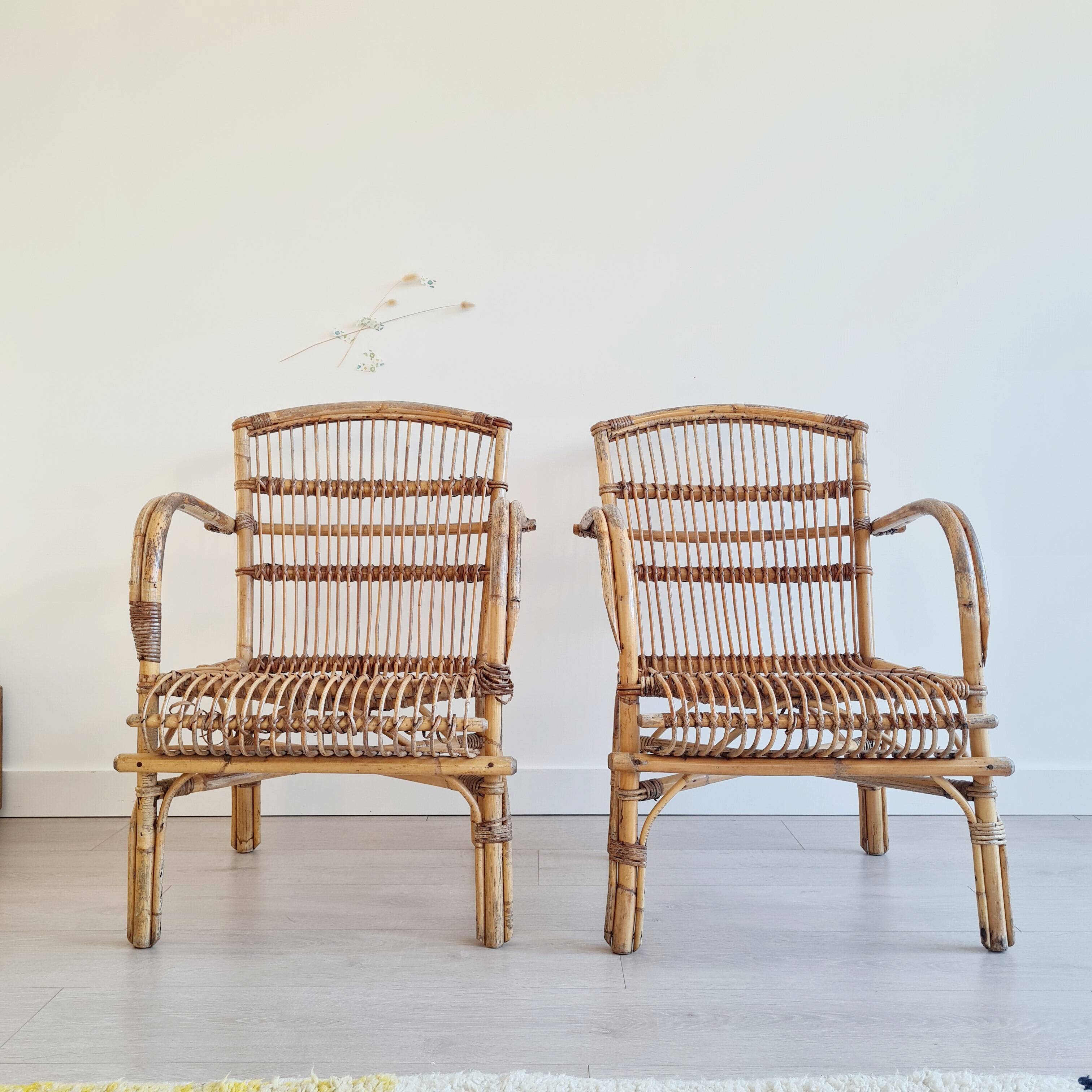 Paire de fauteuils anciens en rotin
