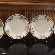 4 assiettes plates en terre de fer modèle OKAN de Longchamp