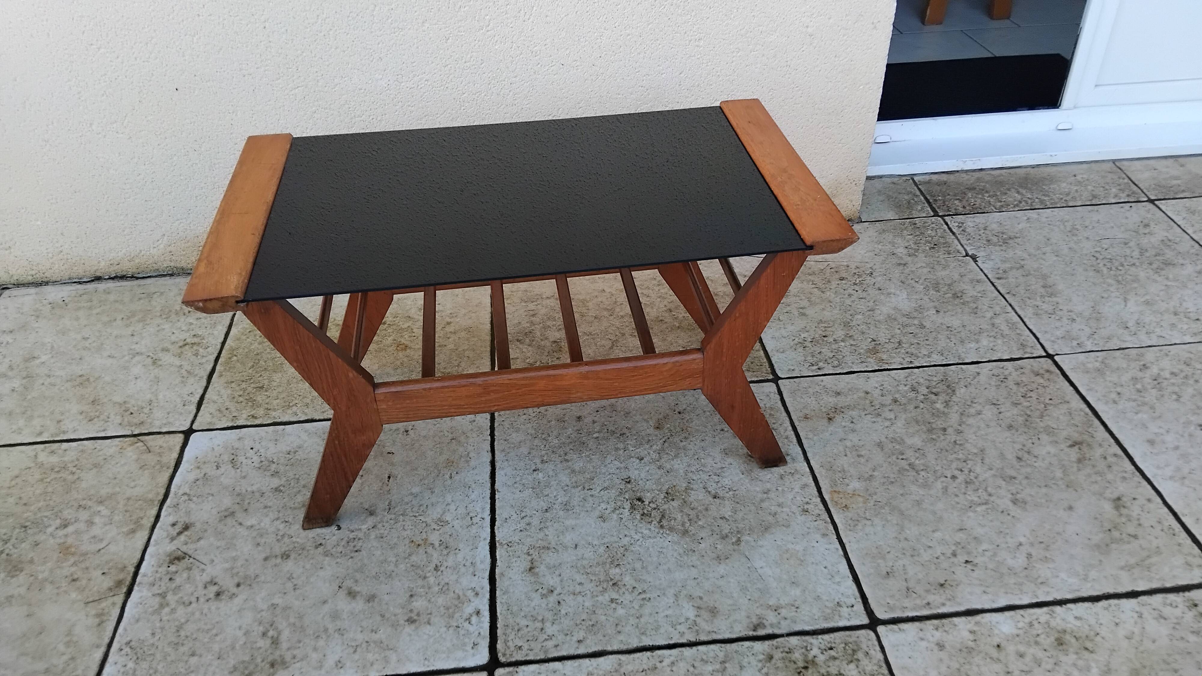 Vintage coffee table from the 1950s reconstruction, wood and glass.