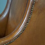 Modern charming armchair in sheepskin