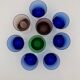 Nine vintage liquor glasses, coloured glass 20th century
