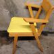 Fauteuil bridge skaï jaune et bois