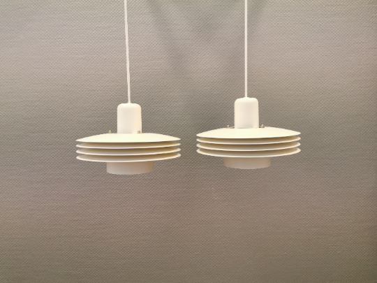 Hanging lamps from Danish ES Horn lighting, produced in the 80s.