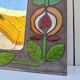 Miroir pierre de lave, fleurs émaillées, années 60-70