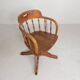 Oak office chair with a spring system and height adjustable, 1930s.
