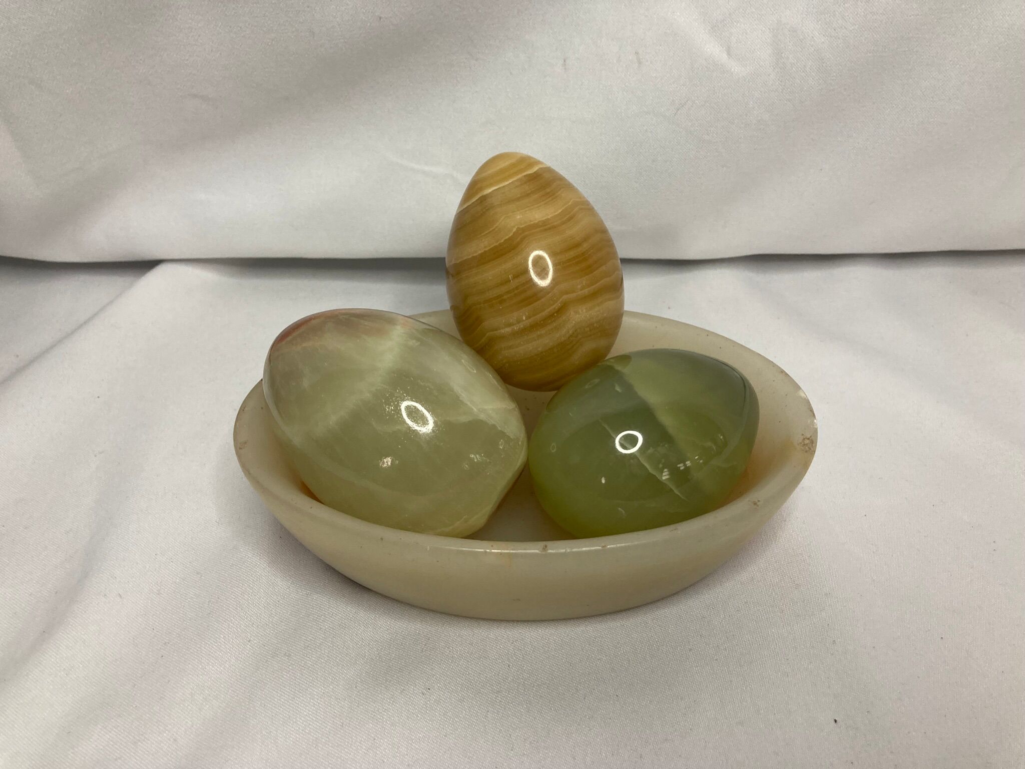 Series of three onyx eggs and XXth cup