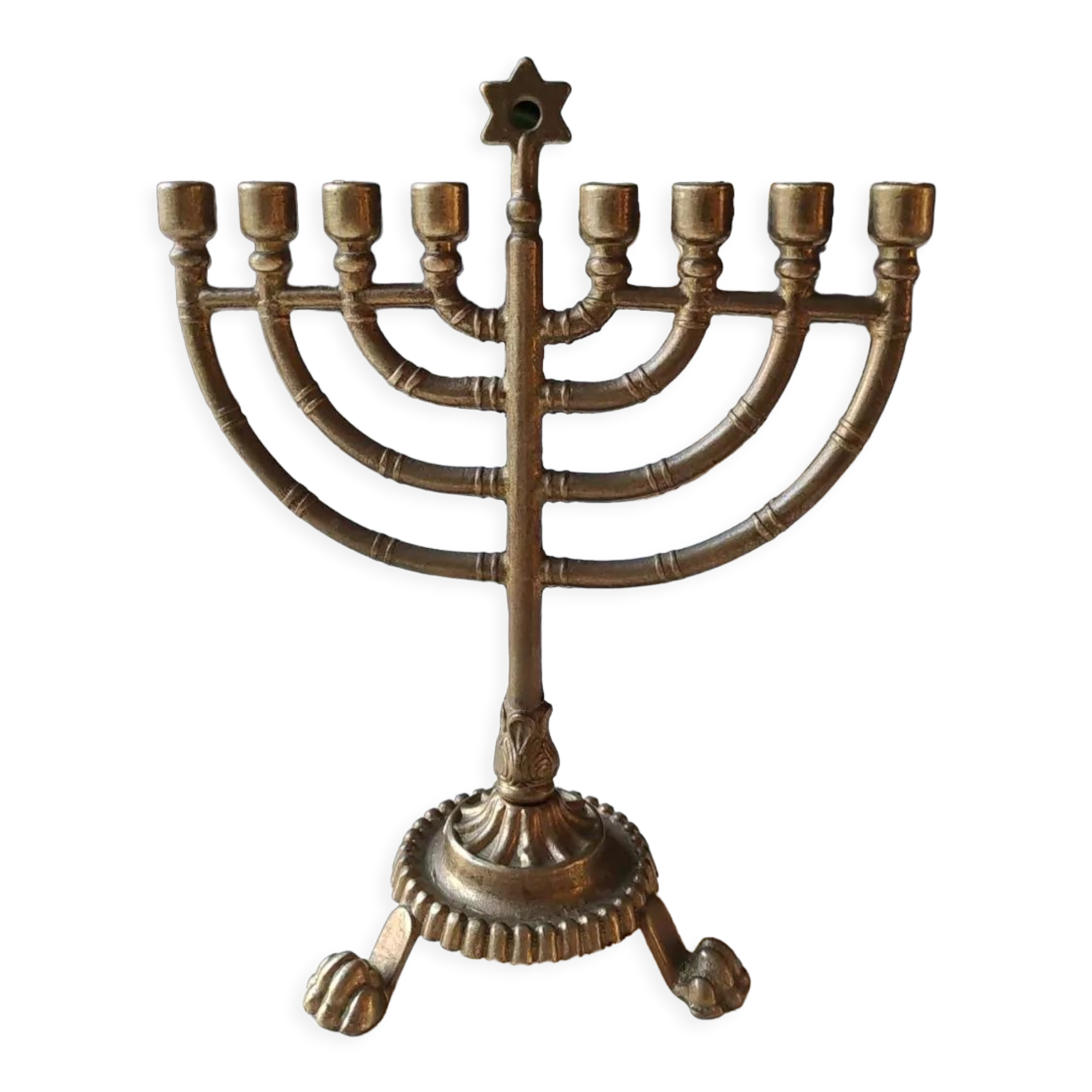 Ancient Menorah of Jerusalem/Jewish Candlestick with 7 tripod branches. Star David. In gilded bronze