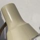 Vintage articulated industrial beige metal desk lamp