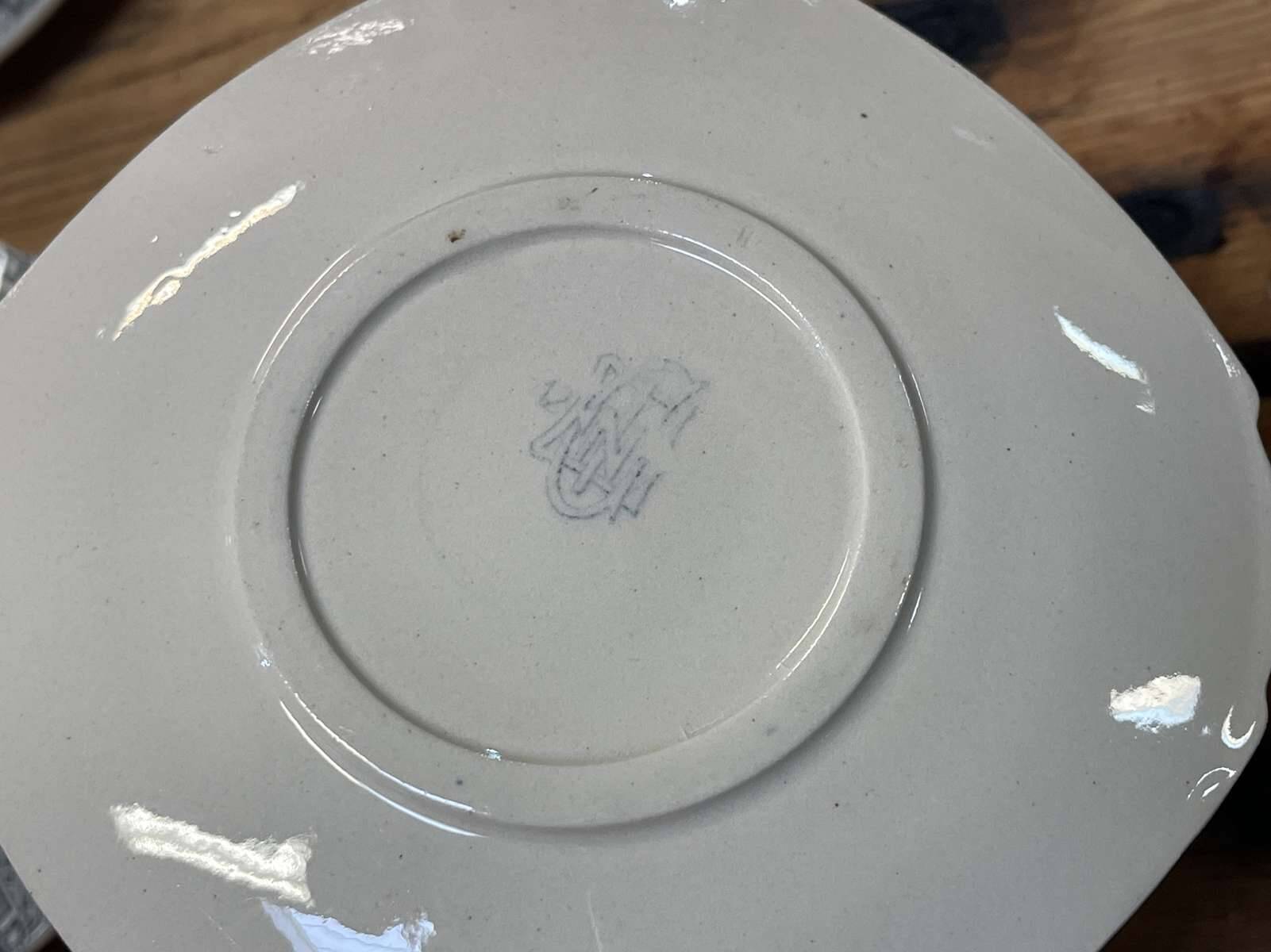 6 cups and saucers in Gien earthenware with Mascaron decoration from the early 20th century.