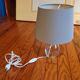 Glass foot-laying lamp