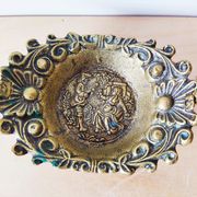 Empty bronze basket pocket with gallant stage décor