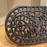 Dessous de plat en fonte ancien