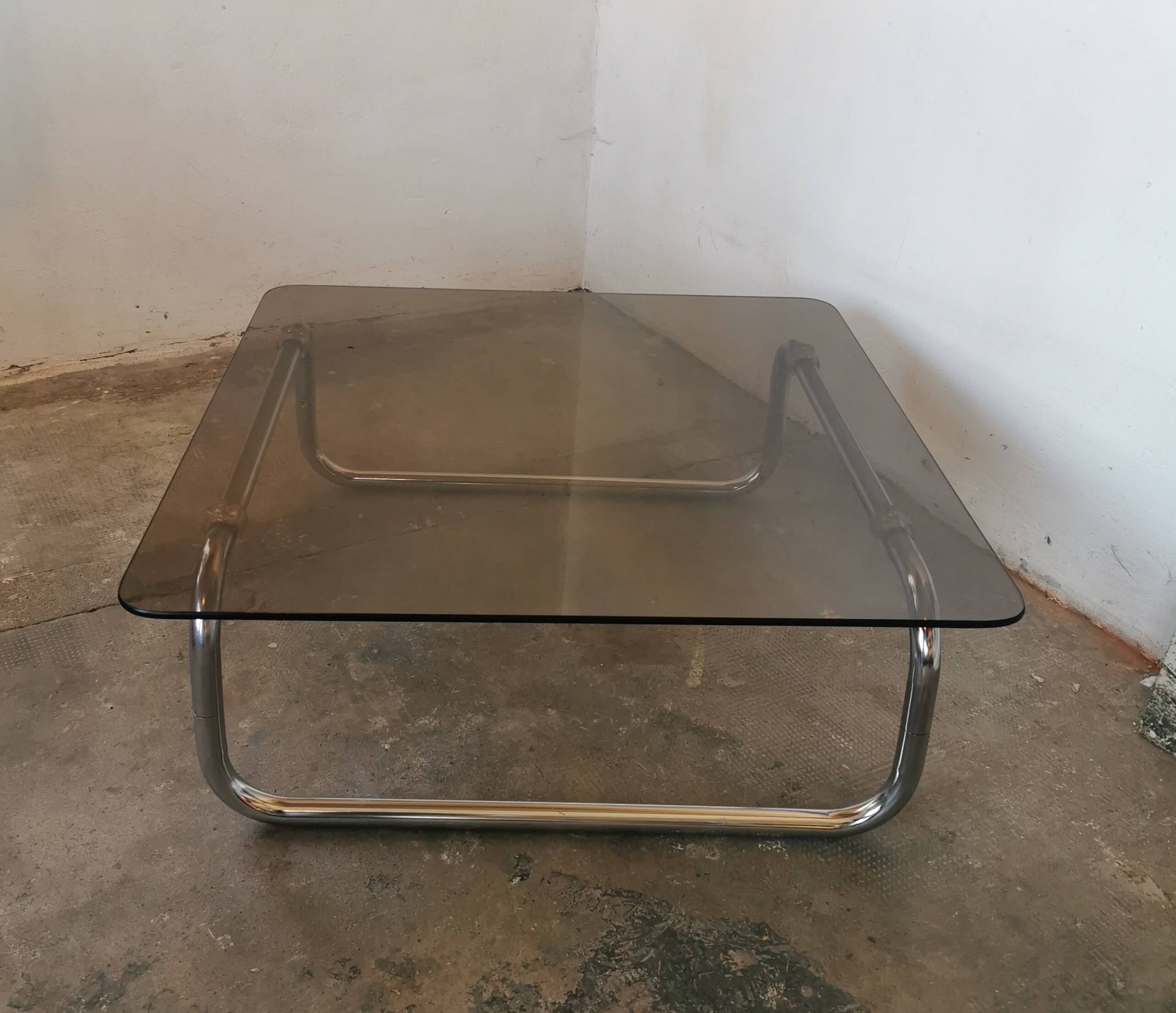 Chrome tubular metal and smoked glass coffee table